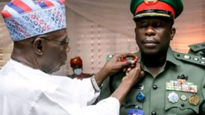 Photo: Obasanjo decorates newly promoted son. Adeboye as Brigadier General