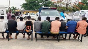 Police parade six suspected killers of sound engineer