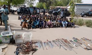 Police parade Kano legislator who allegedly led mob to burn INEC office